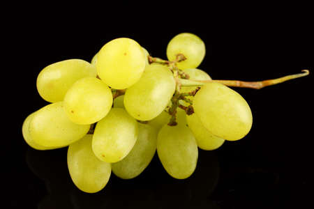 yellow grape Sultana Thompson Seedless Kishmish on black backgroundの写真素材
