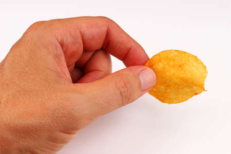 Potato chips on a white backgroundの写真素材