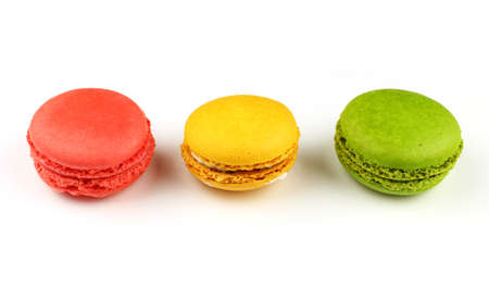 Several Macaron sweets cookies on a white backgroundの写真素材