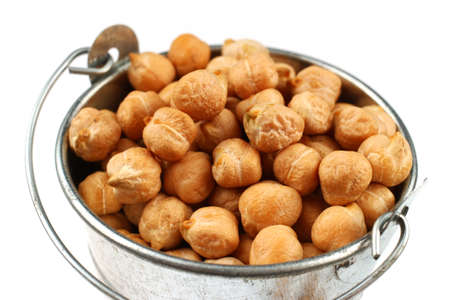 chickpeas buckets on a white background closeupの写真素材