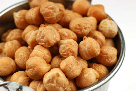 chickpeas buckets on a white background closeupの写真素材