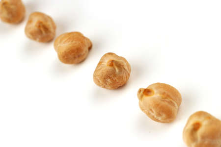 several chickpeas on a white background closeupの写真素材