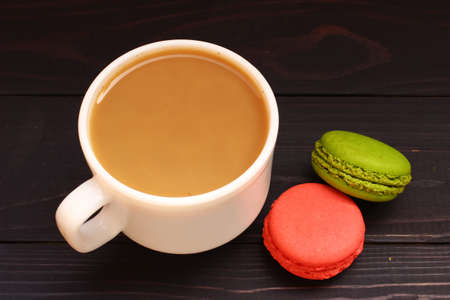 Macaron sweets cookies and coffee with milkの写真素材