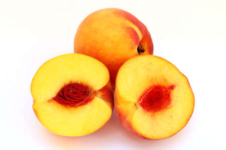Peaches on a white background close upの写真素材