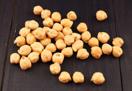 chickpeas peas on a dark background closeupの写真素材