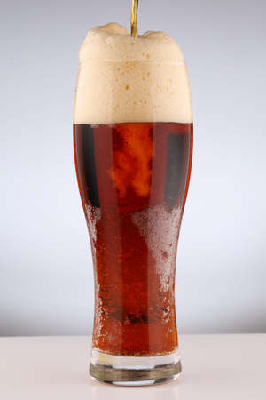Kvass soft drink in a glass on a white backgroundの写真素材