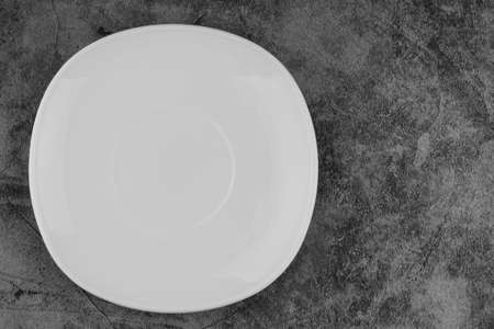 White empty plate on a gray backgroundの写真素材