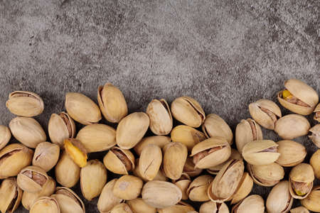 Pistachios are delicious nuts place for text cope spaceの写真素材