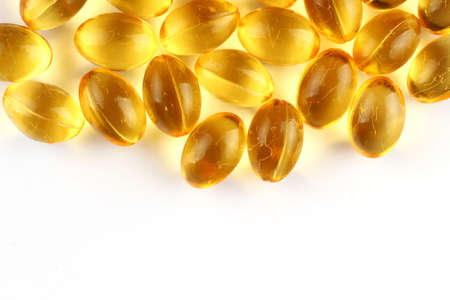 Fish oil in capsules on a white background place for text cope space
