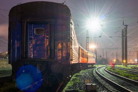 Passenger train at the night stationの写真素材
