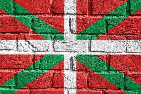 Basque flag close-up on the wallの写真素材