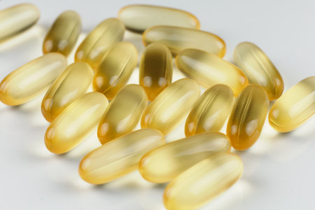 Omega 3 gelatin capsules on white close-upの写真素材