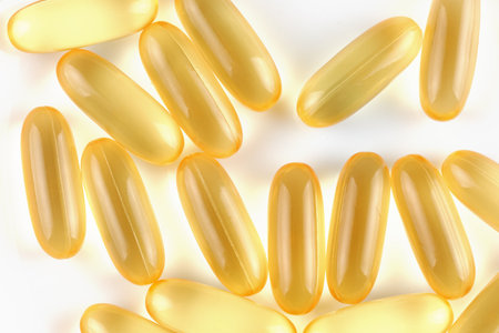 Omega 3 gelatin capsules on a white backgroundの写真素材