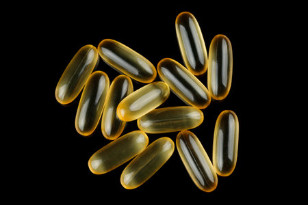 Omega 3 gelatin capsules on a black background Top viewの写真素材