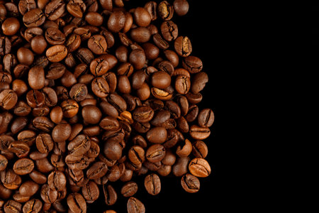 Coffee beans on a black background.の写真素材