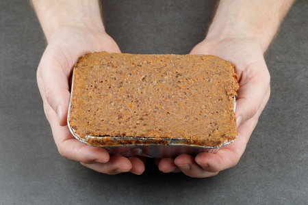 Liver pate in a foil container.