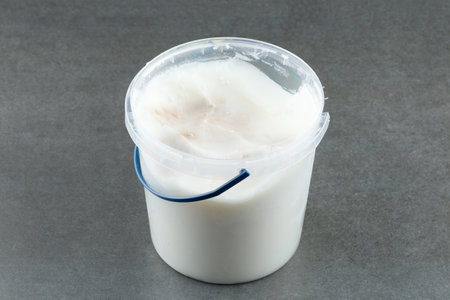 Lard in a plastic bucket.の写真素材