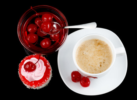 Creamy vanilla cake with cherryの写真素材