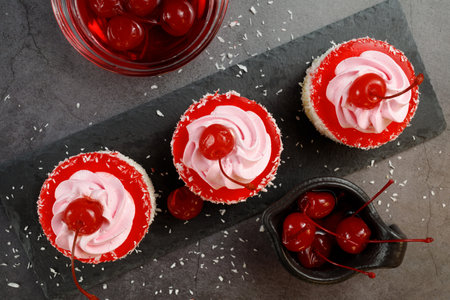 Cake with cherry. pink cup cakeの写真素材