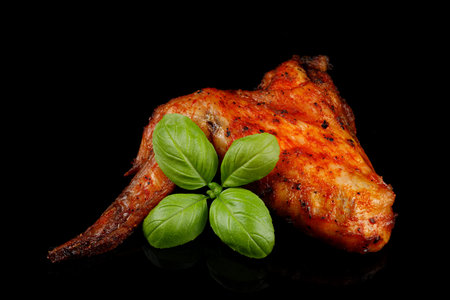 Baked chicken wings with basil. Baked chicken wings with spices and Basilの写真素材