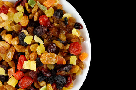 Dried exotic fruits on a plate.の写真素材