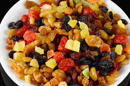 Dried exotic fruits close-up. Raisins, candied fruit and dried cherries.の写真素材