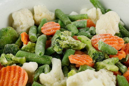 Frozen vegetables close-up. Heap of frozen vegetable mixの写真素材