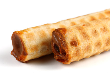 Homemade wafer rolls with condensed milk. Homemade pastries with condensed milk.の写真素材