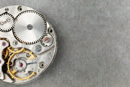 clock mechanism close-up. inside the clock. close up of cogwheels in clockworkの写真素材