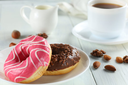 Donuts with coffee and milk. donuts and cup of coffeeの写真素材