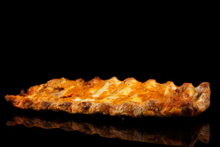 Baked rib on black background isolate.の写真素材