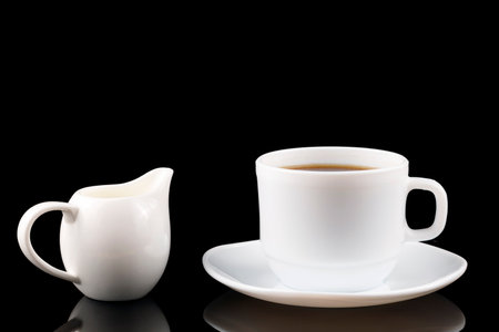 Coffee with milk on a black backgroundの写真素材