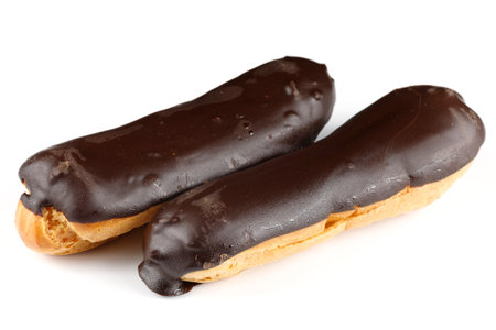 Chocolate eclairs on white isolateの写真素材