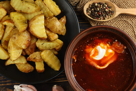Ukrainian borscht with sour cream and fried potatoes. Ukrainian food.の写真素材
