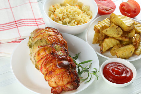 boneless meat roulade on the table. Delicious food in the restaurant.の写真素材