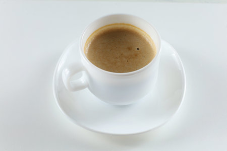Cappuccino in white cup isolate.の写真素材