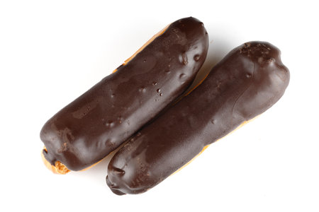 Chocolate eclairs on white isolate. top viewの写真素材