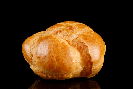 Eclair on black isolate close-upの写真素材