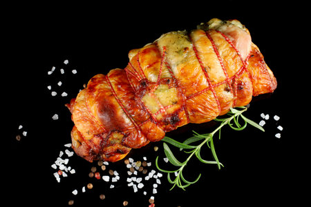 boneless meat roulade on the table. Delicious food in the restaurant.の写真素材