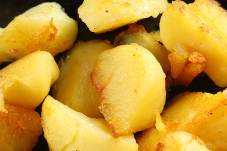 Fried potatoes close-up. Tasty and simple food. Traditional lunch.の写真素材