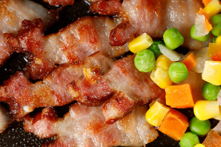 Vegetables with bacon. Tasty and simple food. Traditional lunch.の写真素材