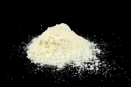 Yellow baby food powder in a pile.の写真素材