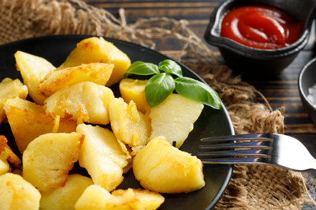 Fried potatoes close-up. Tasty and simple food. Traditional lunch.の写真素材