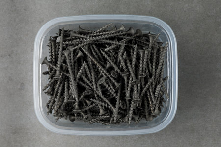 wood screws close-up. many black screwsの写真素材