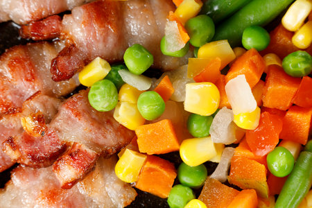 Vegetables with bacon. Tasty and simple food. Traditional lunch.の写真素材