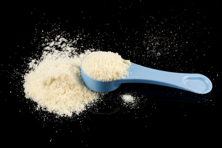 Yellow baby food powder in a pile.の写真素材