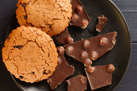 Pieces of chocolate with oatmeal cookies.の写真素材