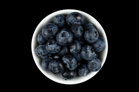 Low blueberry in a white bowl. top view.の写真素材