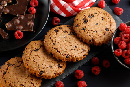 Americano cookies with chocolate and berries. Oatmeal cookies with chocolate.の写真素材