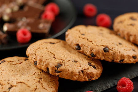 Americano cookies with chocolate and berries. Oatmeal cookies with chocolate.の写真素材